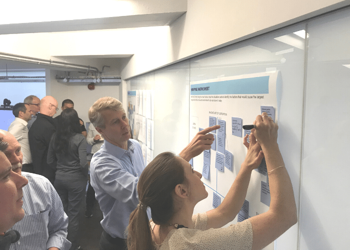 Courtney McConnochie mapping scenarios with company CEO